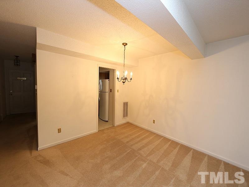 2816 Wycliff Road Raleigh, NC 27607 - Photo 3 of 12 a view of empty room with a window