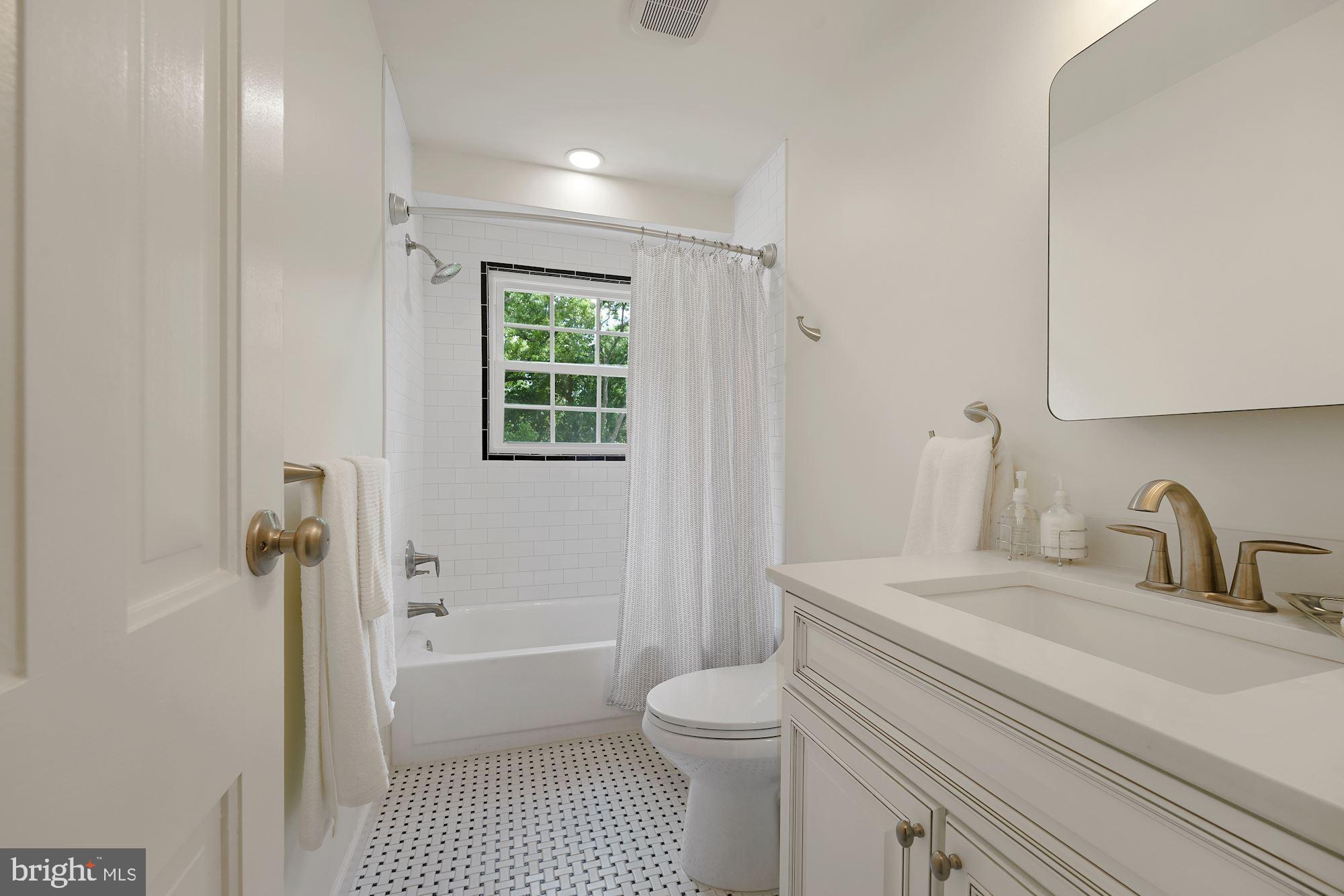 5947 Telegraph Road Alexandria, VA 22310 - Photo 34 of 57 Remodeled Hall Bath w/ Tub