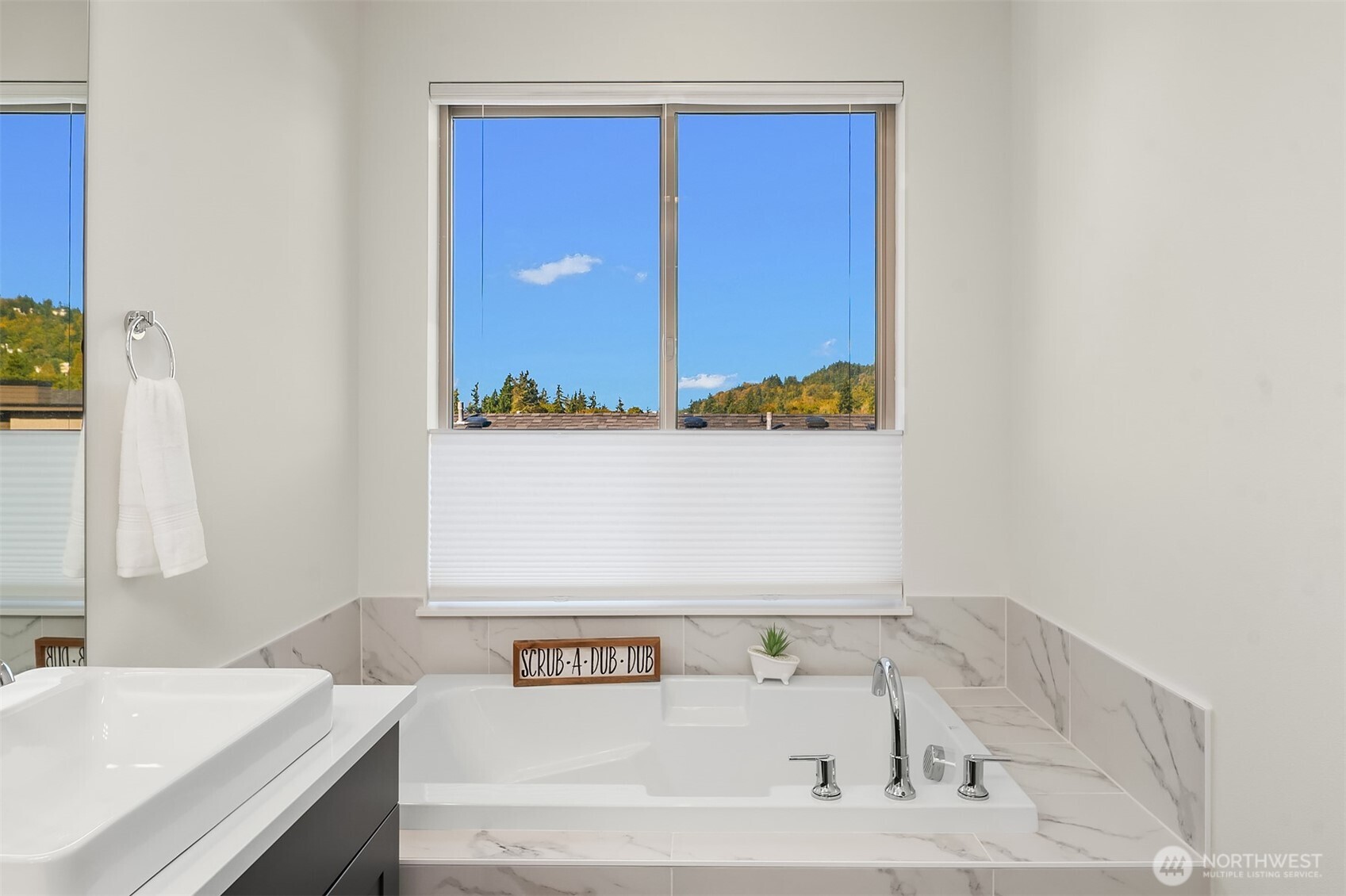 13368 Southeast 68th Place Newcastle, WA 98059 - Photo 22 of 28 a bath tub sitting next to a white sink