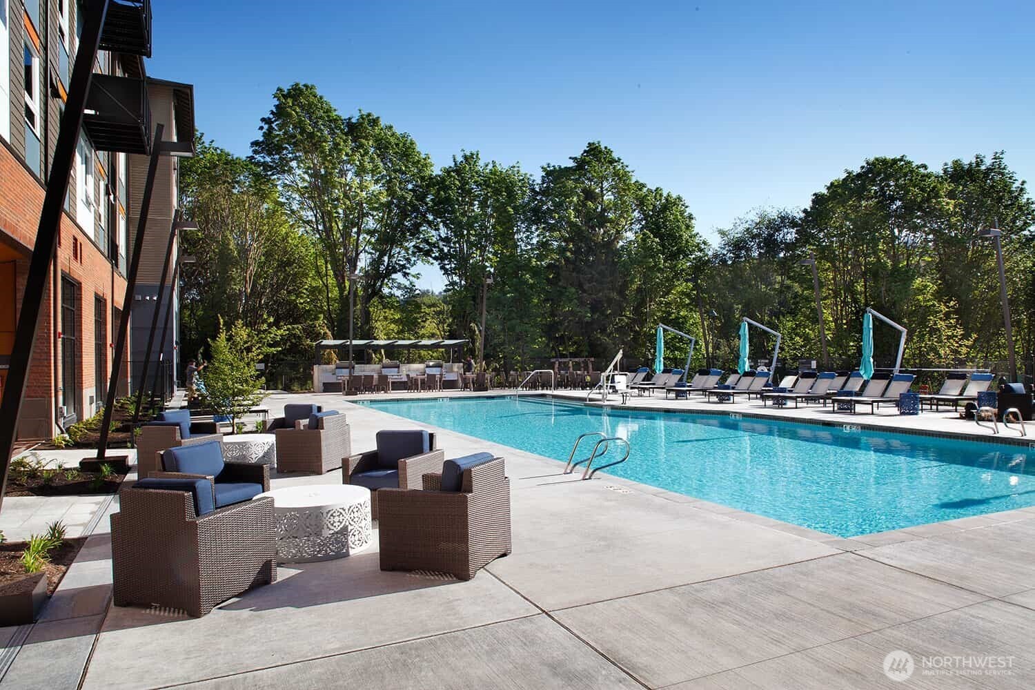 13368 Southeast 68th Place Newcastle, WA 98059 - Photo 27 of 28 a view of a swimming pool with couches and lounge chairs