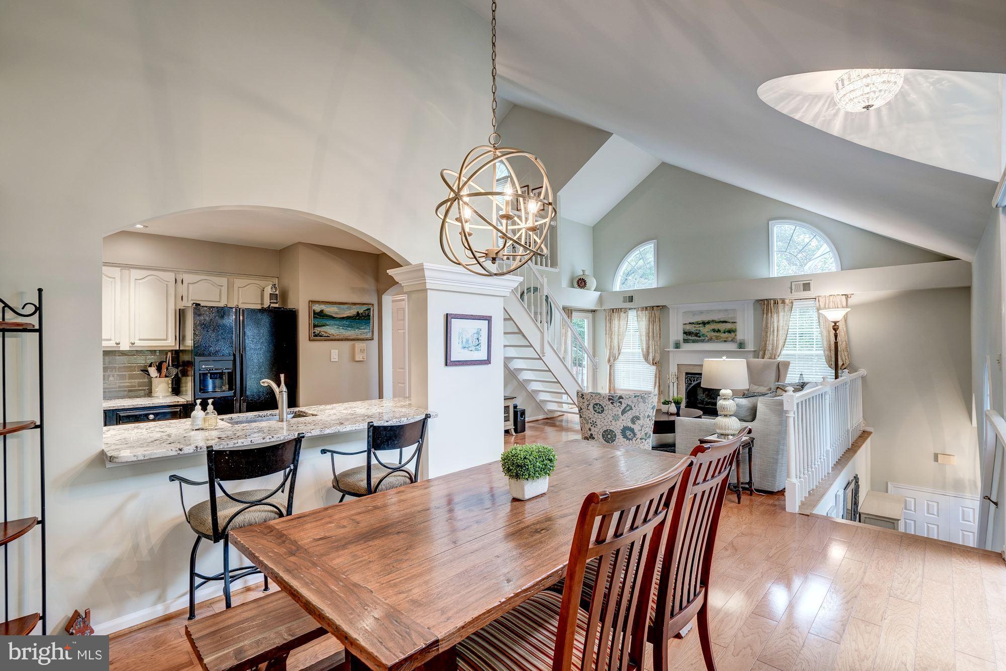 1473 Church Hill Place Reston, VA 20194 - Photo 12 of 46 DINING ROOM AND GREAT ROOM FLOW