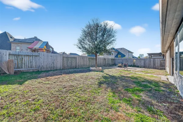a swimming pool with wooden fence