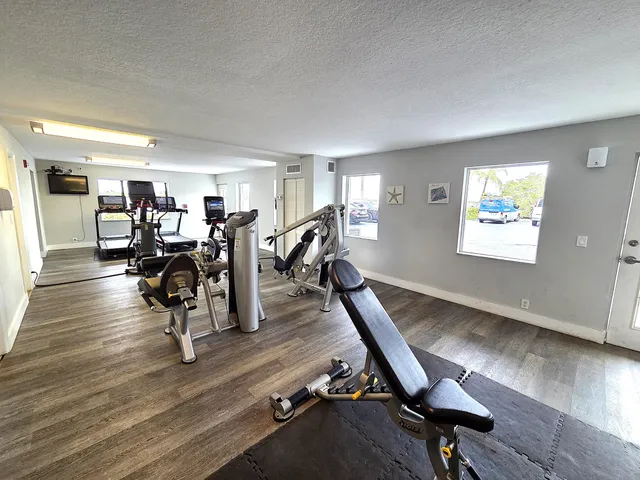 a view of a room with gym equipment