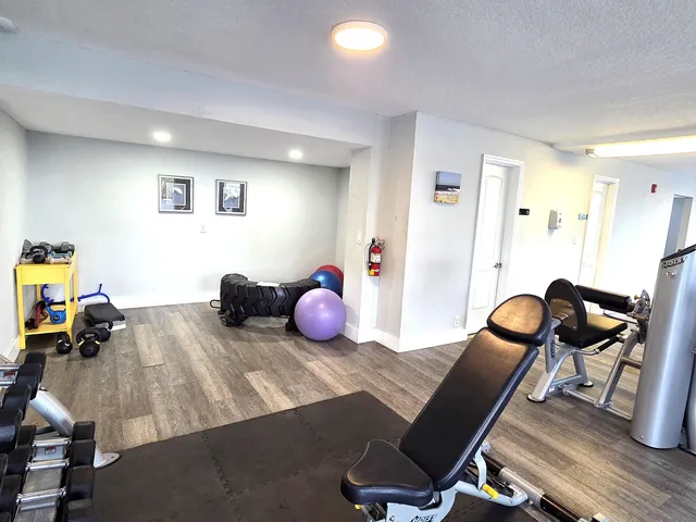 a room with furniture and wooden floor