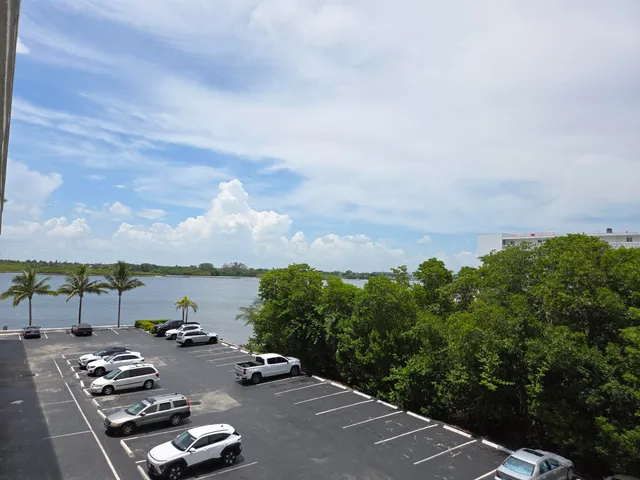 an aerial view of multiple houses with outdoor space