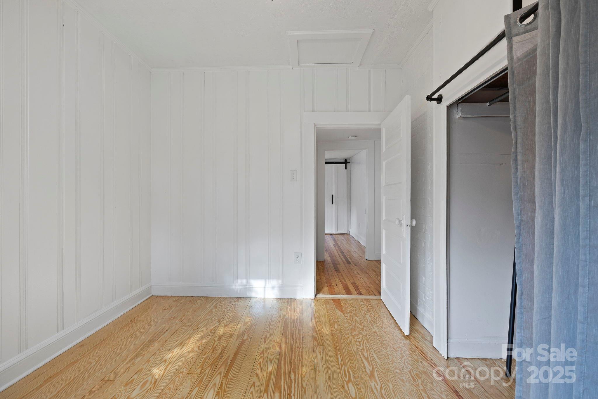21 Maple Street Brevard, NC 28712 - Photo 28 of 29 a view of empty room with wooden floor