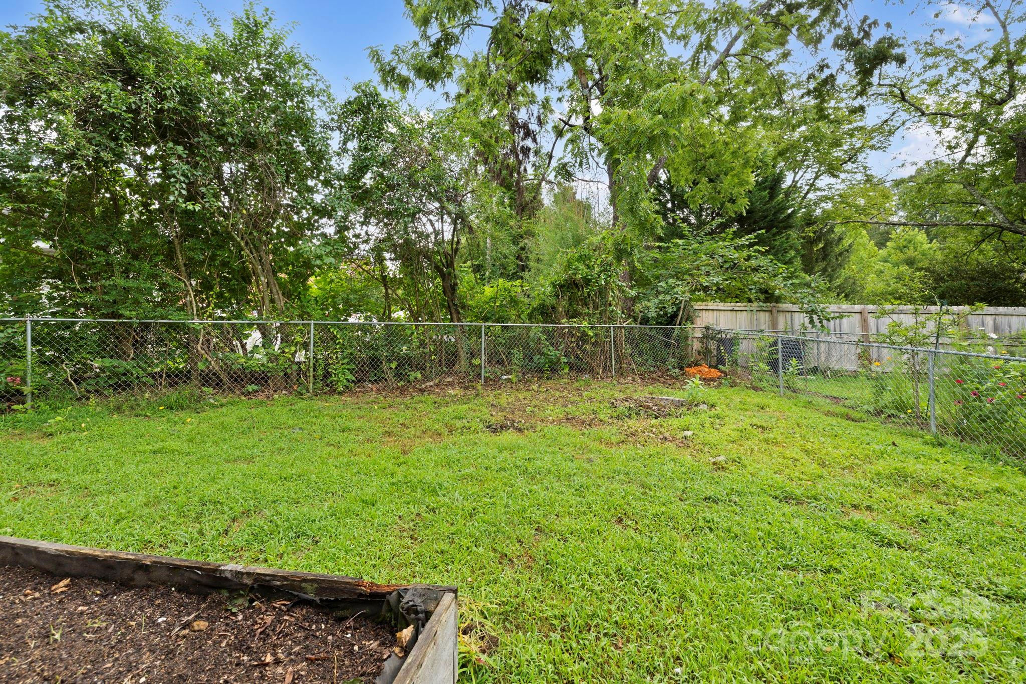 21 Maple Street Brevard, NC 28712 - Photo 10 of 29 a view of a backyard