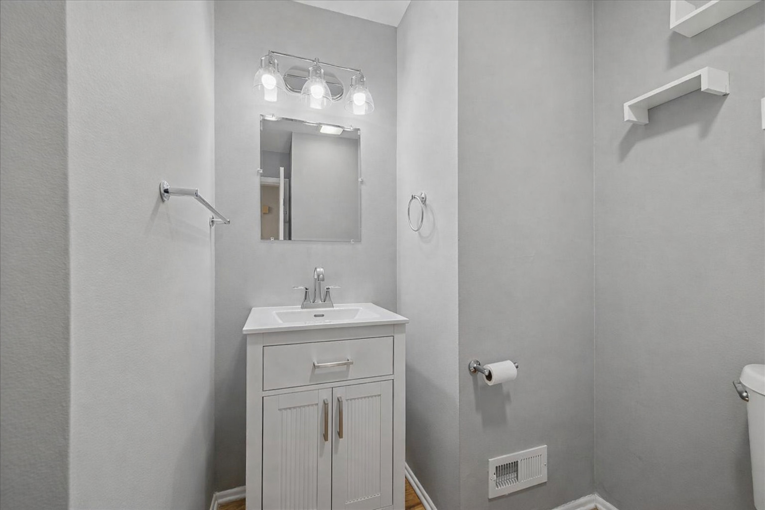 3120 Antelope Springs Road Northbrook, IL 60062 - Photo 12 of 27 a bathroom with a sink a toilet and mirror