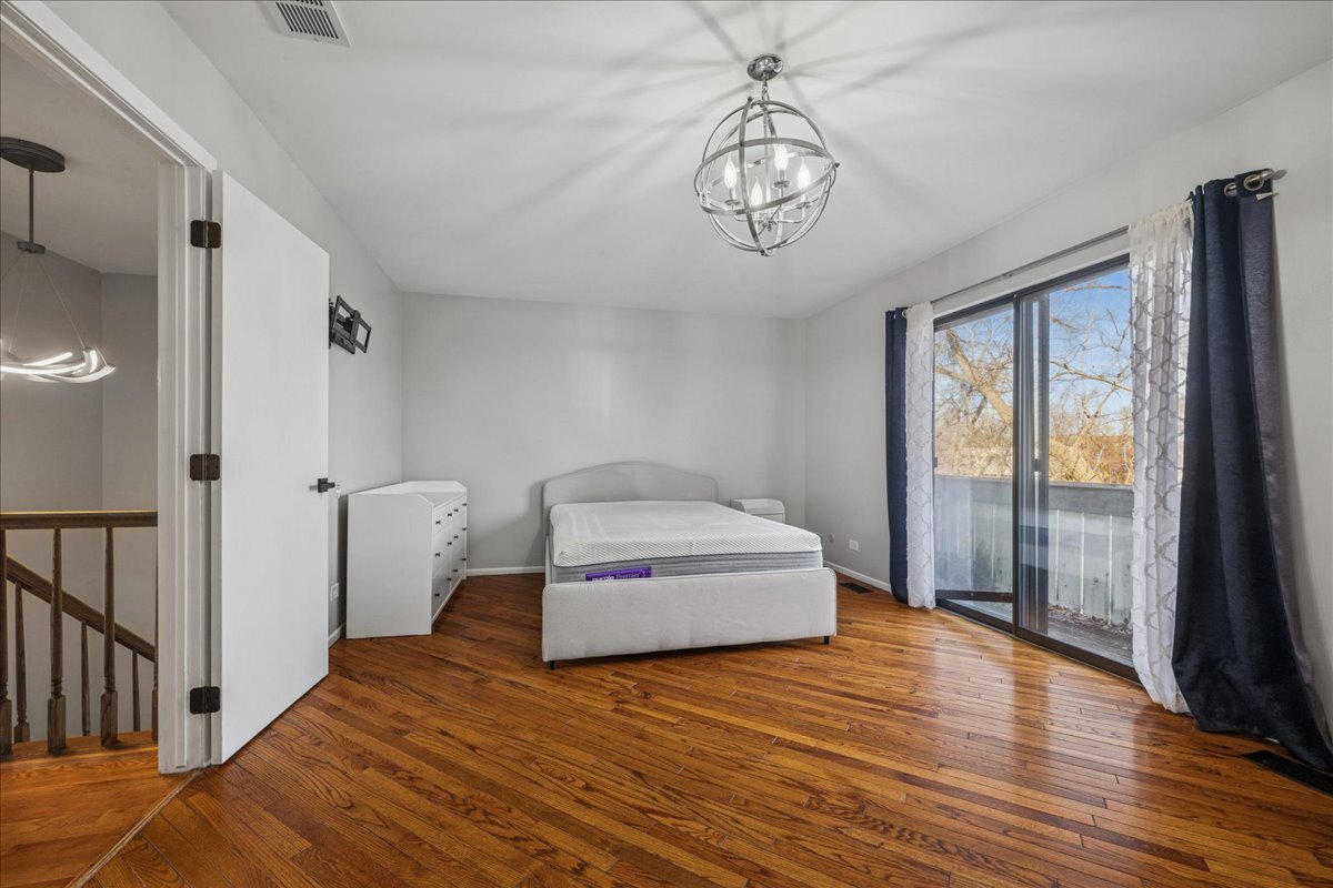 3120 Antelope Springs Road Northbrook, IL 60062 - Photo 13 of 27 a bedroom with a bed and a window