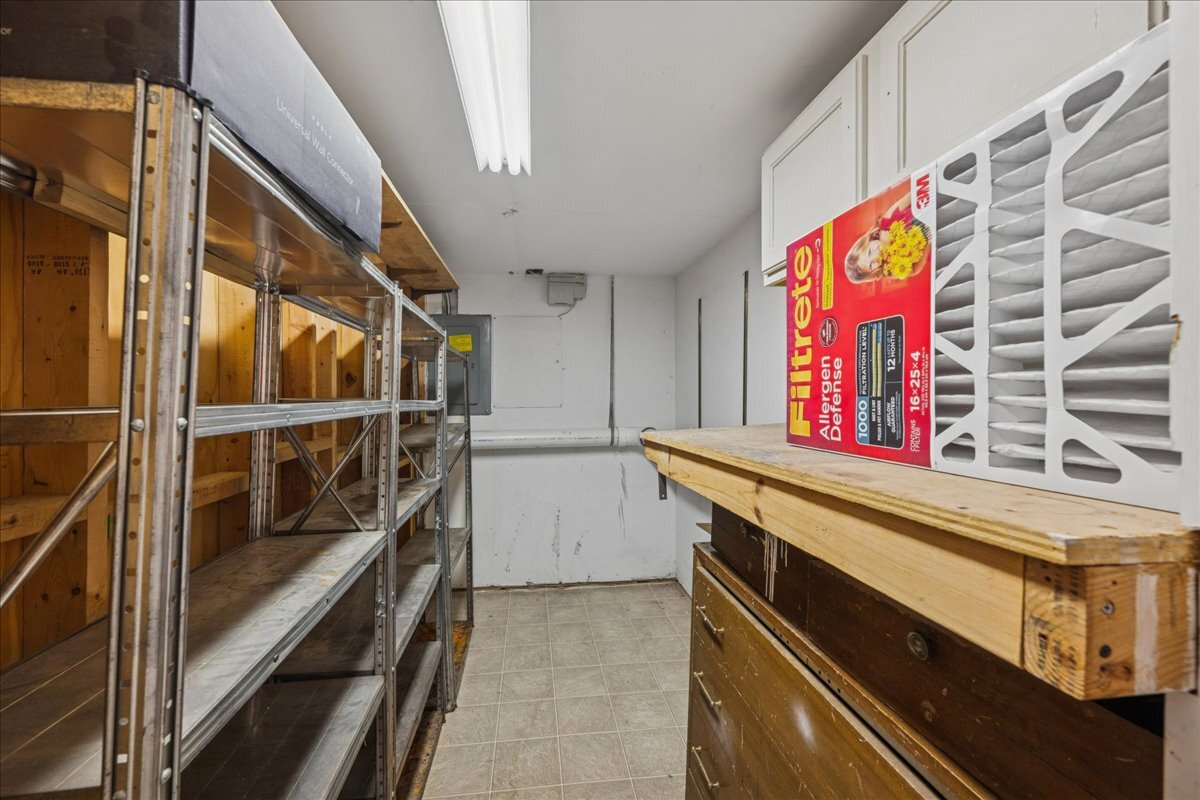 3120 Antelope Springs Road Northbrook, IL 60062 - Photo 22 of 27 a storage room with wooden floor washer and dryer