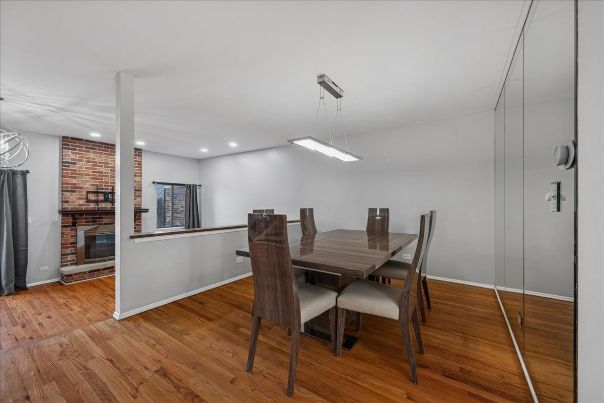 3120 Antelope Springs Road Northbrook, IL 60062 - Photo 6 of 27 a dining room with furniture and wooden floor