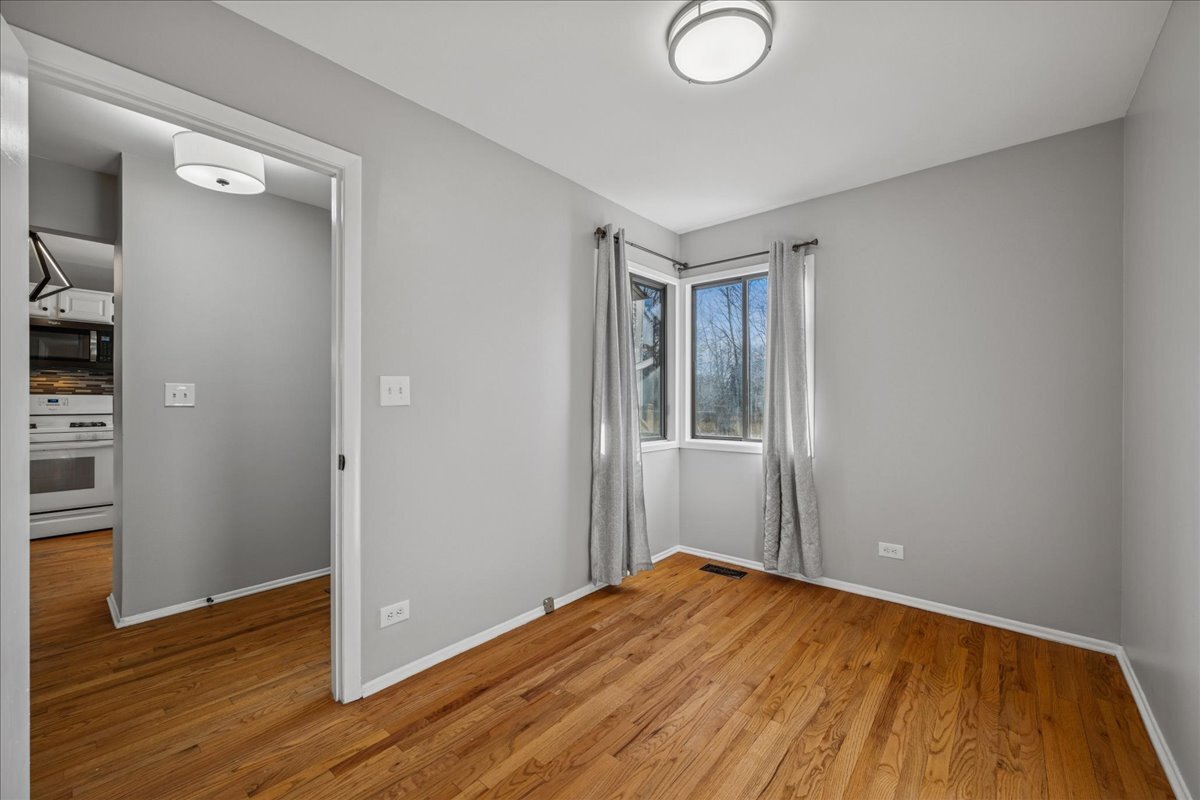 3120 Antelope Springs Road Northbrook, IL 60062 - Photo 10 of 27 an empty room with wooden floor and closet