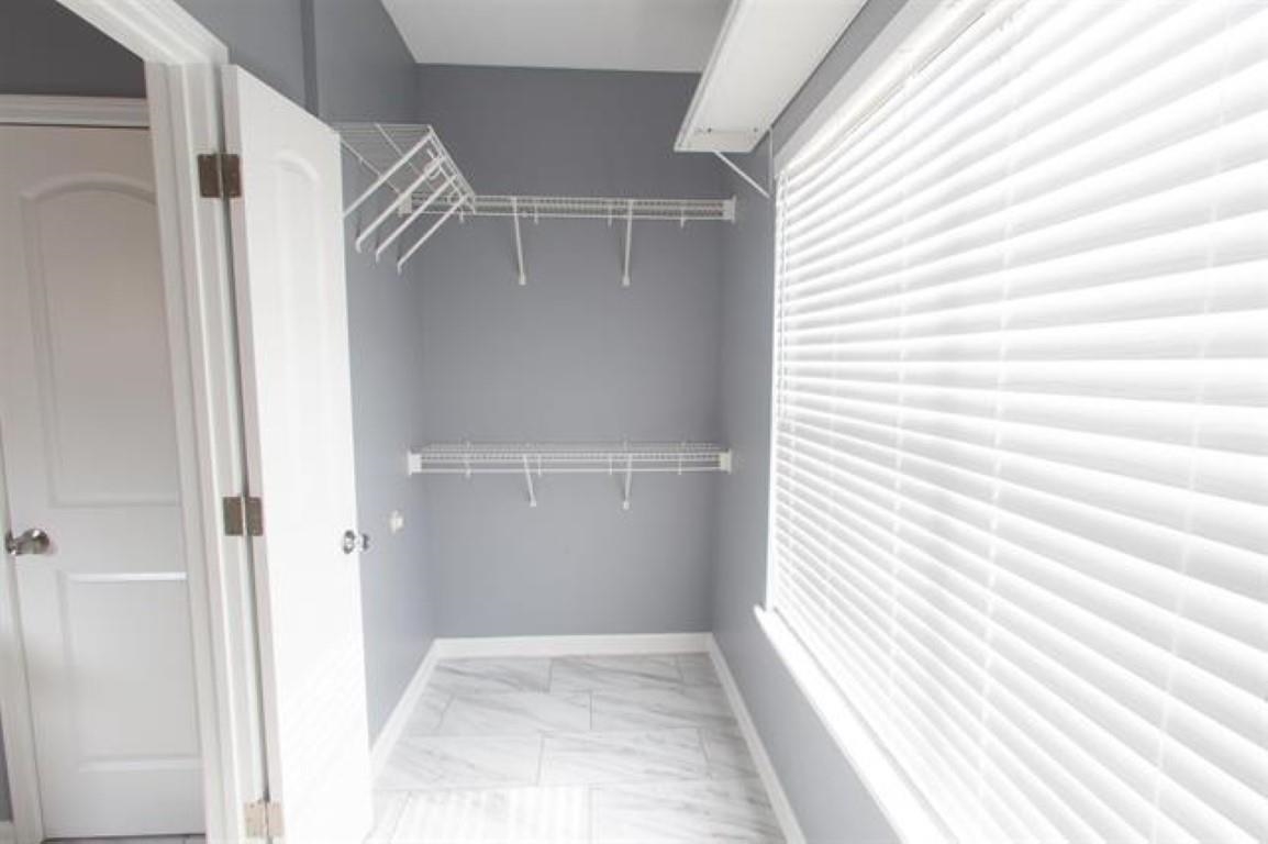 3430 Roxee Run Cove Bartlett, TN 38133 - Photo 14 of 32 a view of entryway with wooden floor