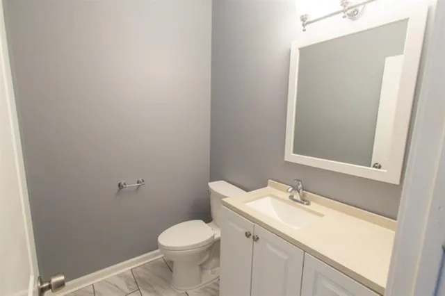 a bathroom with a sink and a toilet