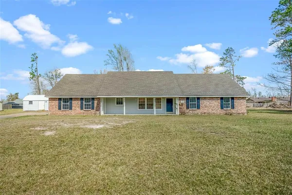 $320,000 | 590 Pinecone Drive, Moss Bluff, LA 70611