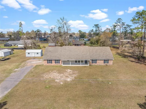 $320,000 | 590 Pinecone Drive, Moss Bluff, LA 70611
