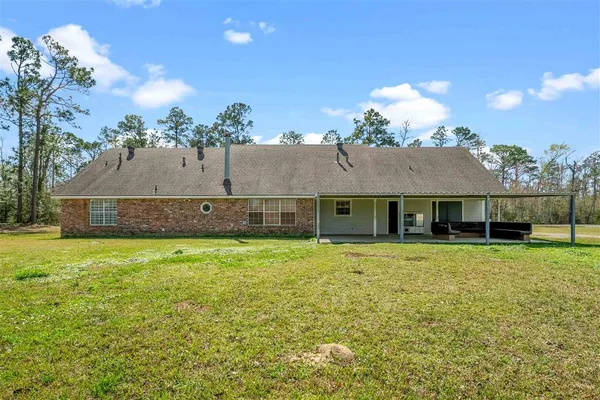 $320,000 | 590 Pinecone Drive, Moss Bluff, LA 70611