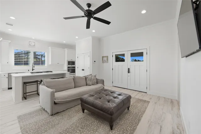 a living room with furniture and a window