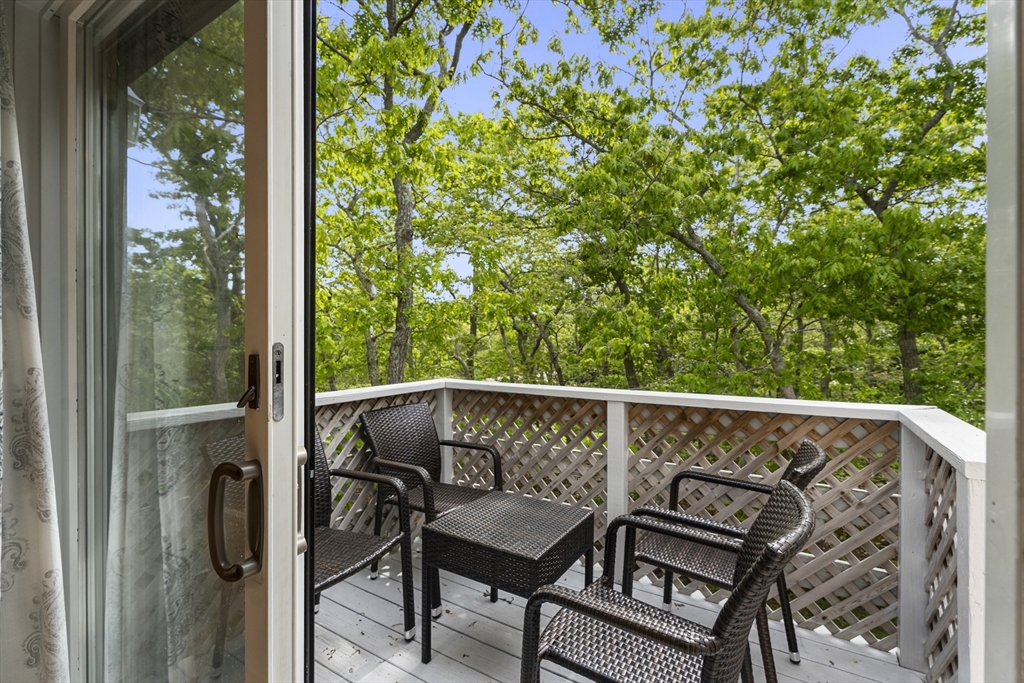 4 Hye Lane Edgartown, MA 02539 - Photo 30 of 41 a view of a chair and table in the balcony