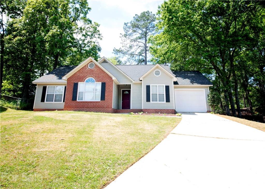 109 Ferntree Court Columbia, SC 29210 - Photo 1 of 34 a front view of a house with a garden