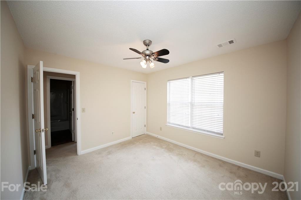 109 Ferntree Court Columbia, SC 29210 - Photo 13 of 34 an empty room with window and ceiling fan