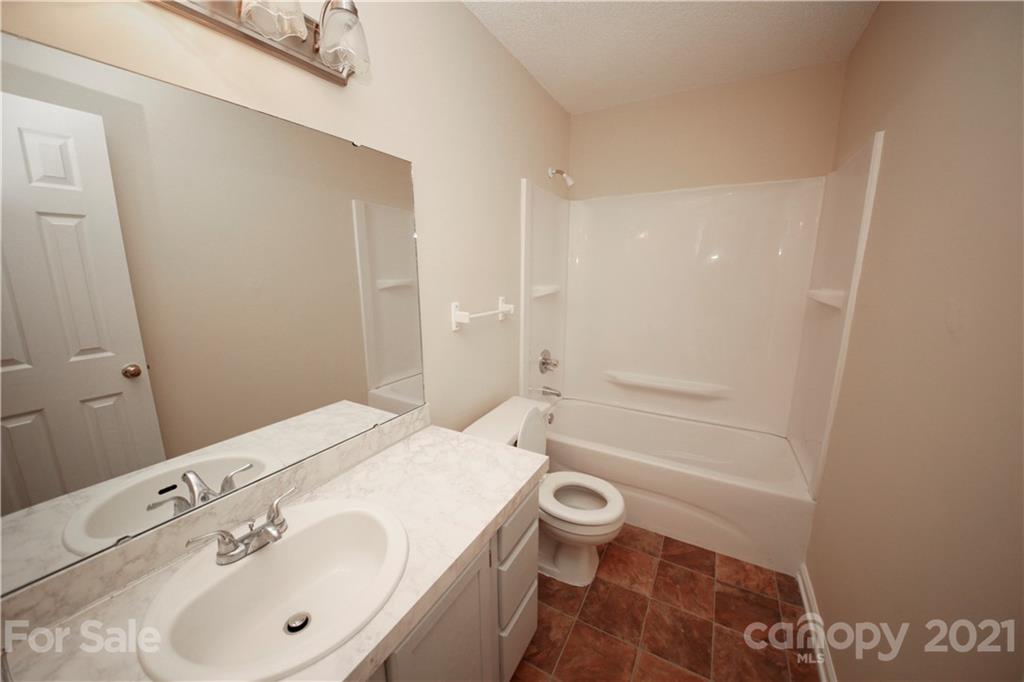 109 Ferntree Court Columbia, SC 29210 - Photo 14 of 34 a bathroom with a sink toilet and shower