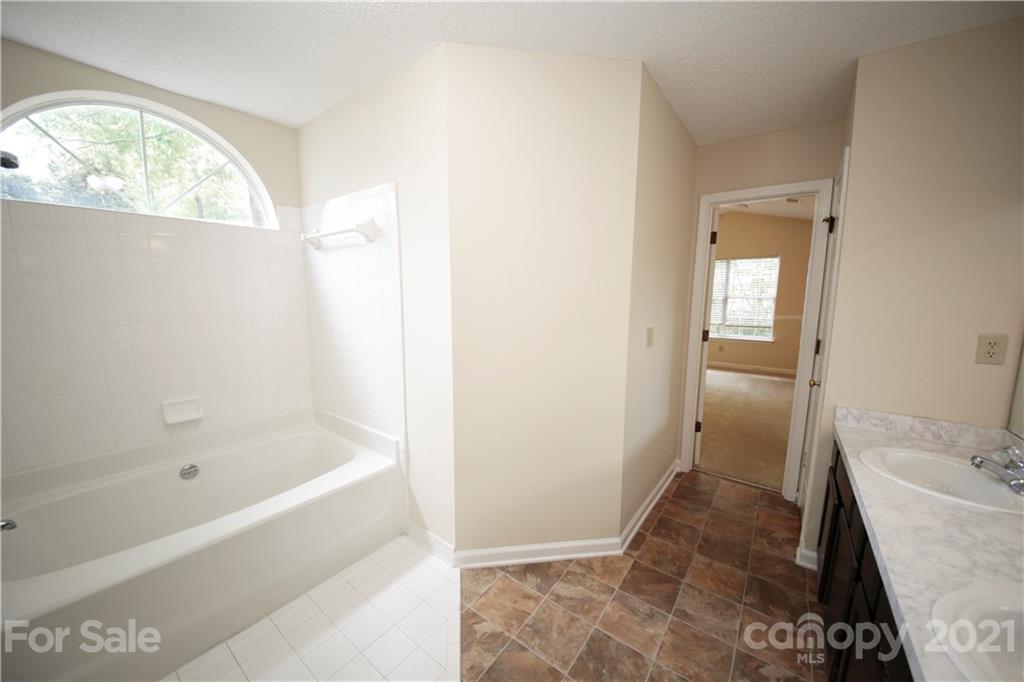 109 Ferntree Court Columbia, SC 29210 - Photo 19 of 34 a bathroom with a sink and tub