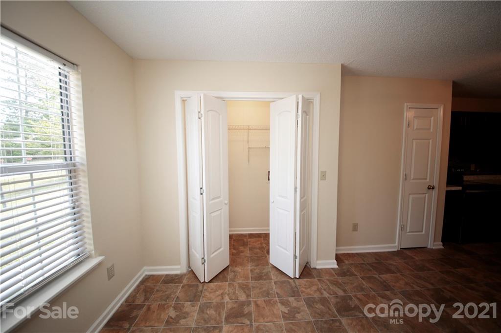 109 Ferntree Court Columbia, SC 29210 - Photo 24 of 34 an empty room with windows and closet