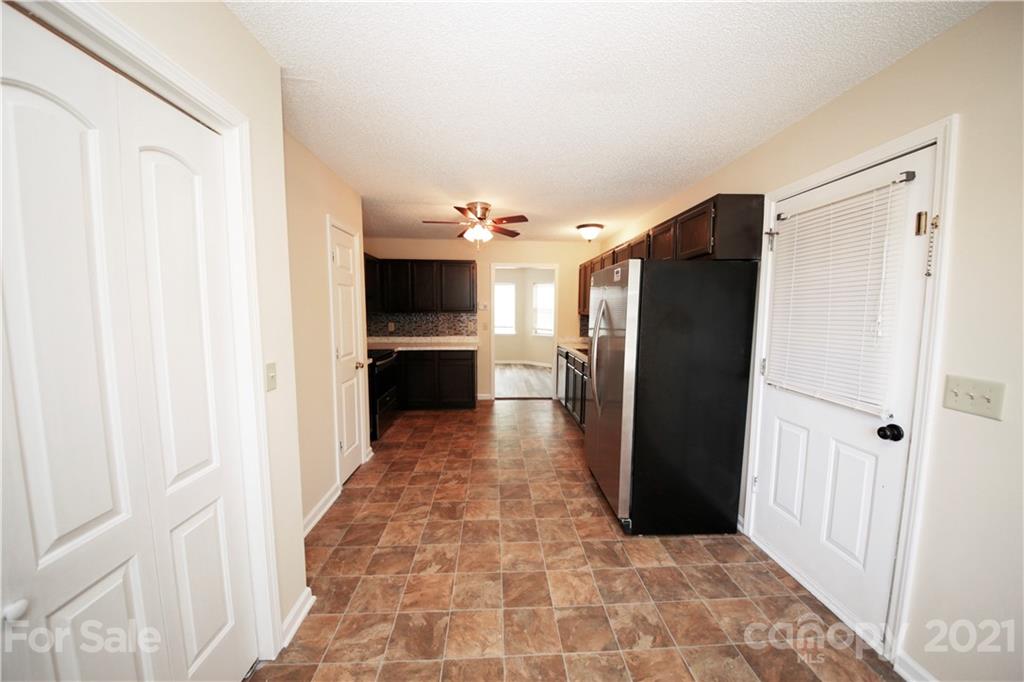 109 Ferntree Court Columbia, SC 29210 - Photo 26 of 34 a view of a refrigerator in kitchen and a window in a kitchen