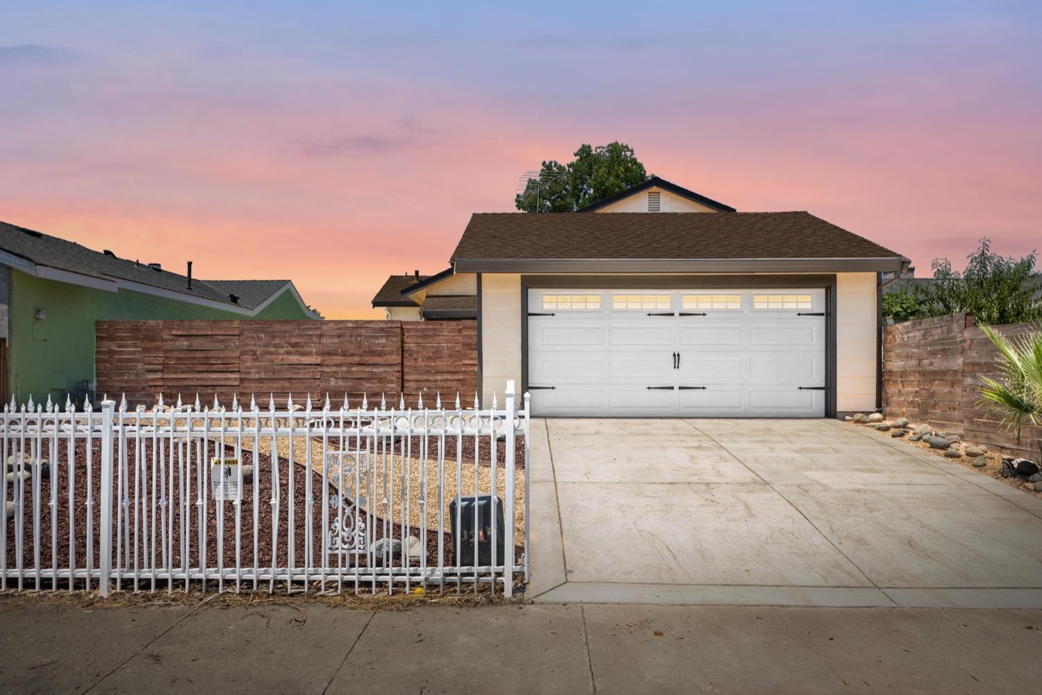 149 Cedar Rock Circle Sacramento, CA 95823 - Photo 1 of 1 a front view of a house with a yard