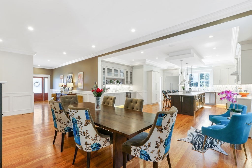 5 Sharpe Road Newton, MA 02459 - Photo 11 of 41 a view of a dining room with furniture and wooden floor