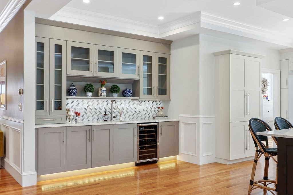 5 Sharpe Road Newton, MA 02459 - Photo 15 of 41 a kitchen with a table and chairs