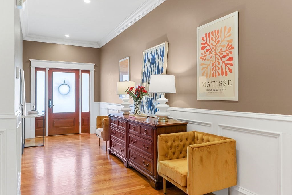 5 Sharpe Road Newton, MA 02459 - Photo 2 of 41 a spacious bedroom with a bed and wooden floor