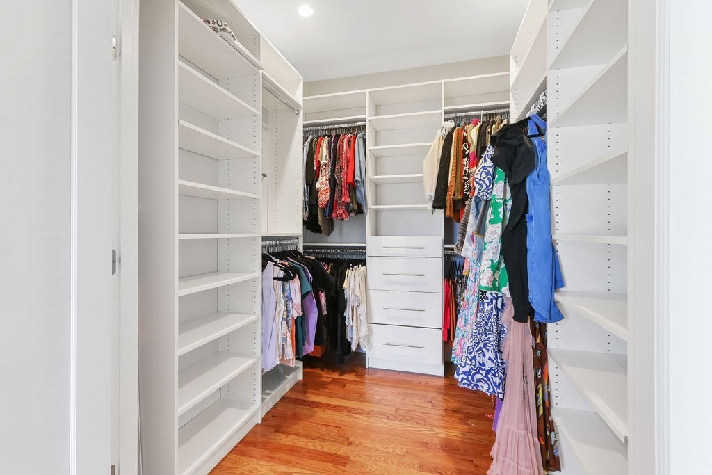 5 Sharpe Road Newton, MA 02459 - Photo 24 of 41 a view of walk in closet with clothes and shoes