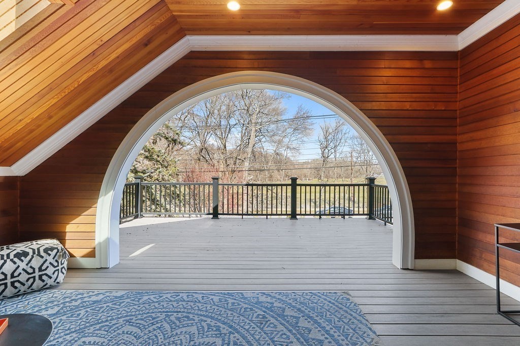5 Sharpe Road Newton, MA 02459 - Photo 29 of 41 a view of entryway with a floor to ceiling window and wooden floor