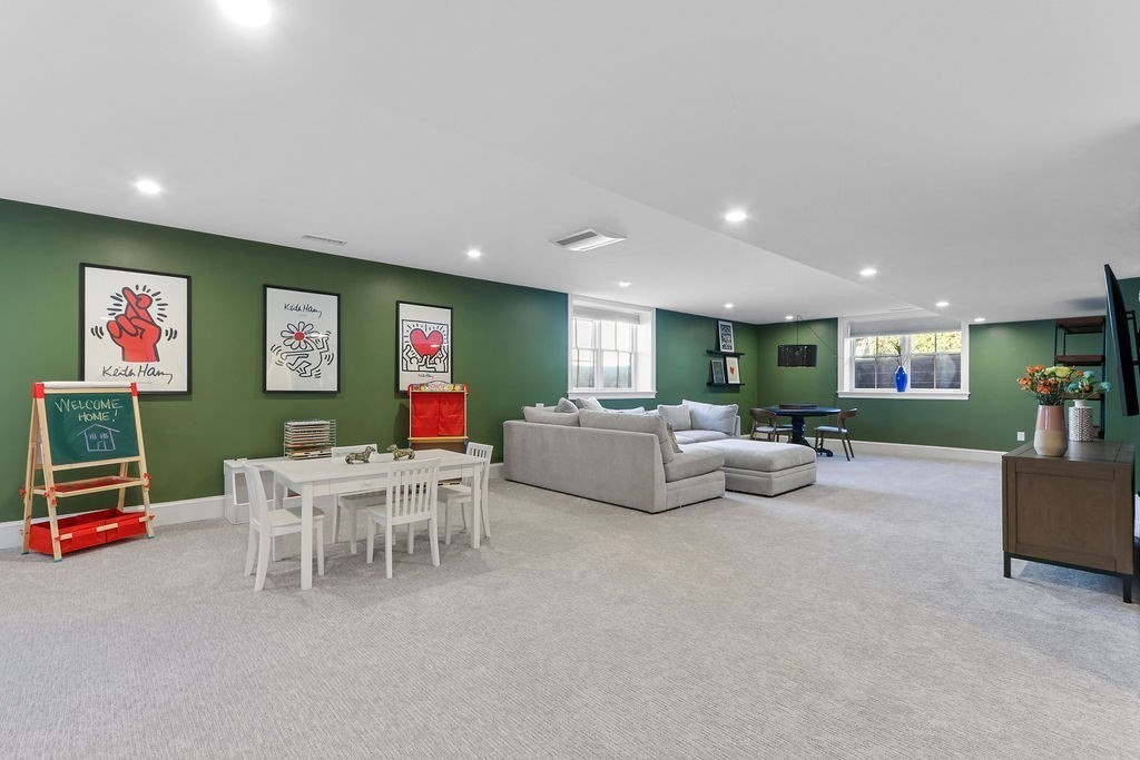 5 Sharpe Road Newton, MA 02459 - Photo 34 of 41 a living room with furniture and a gym