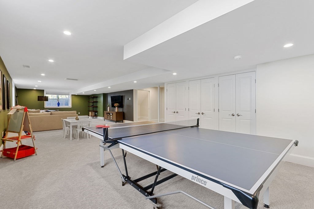 5 Sharpe Road Newton, MA 02459 - Photo 35 of 41 a living room with furniture pool table flat screen tv and windows