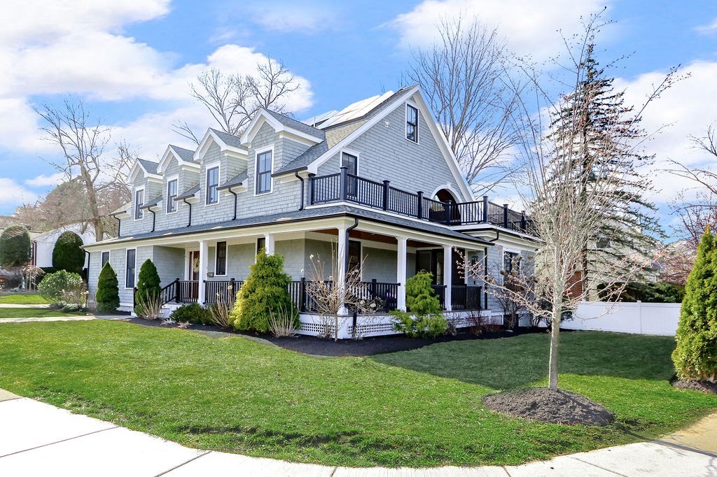 5 Sharpe Road Newton, MA 02459 - Photo 39 of 41 a front view of a house with garden