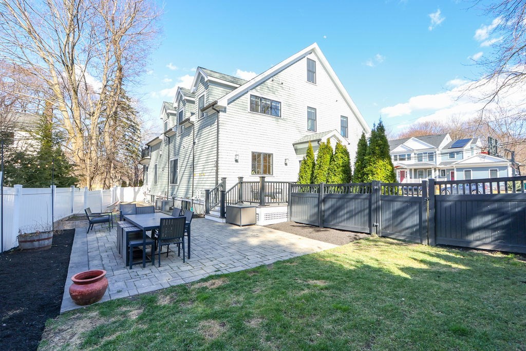 5 Sharpe Road Newton, MA 02459 - Photo 41 of 41 a view of a house with backyard and sitting area
