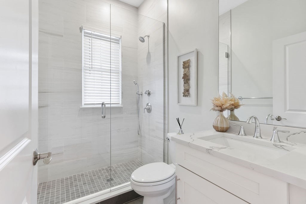 5 Sharpe Road Newton, MA 02459 - Photo 5 of 41 a bathroom with a sink toilet and shower