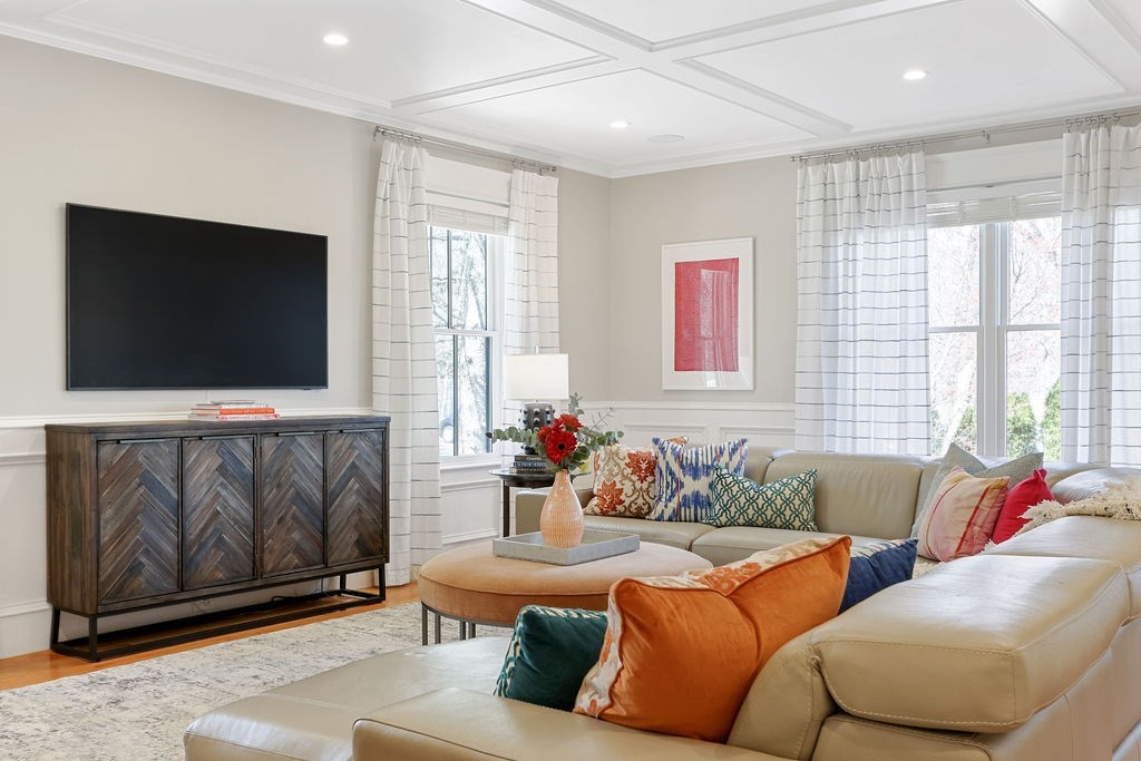 5 Sharpe Road Newton, MA 02459 - Photo 8 of 41 a living room with furniture and a flat screen tv