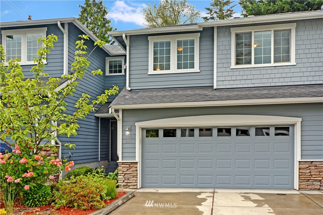 907 225th Place Southeast Bothell, WA 98021 - Photo 1 of 20 a front view of a house with a yard