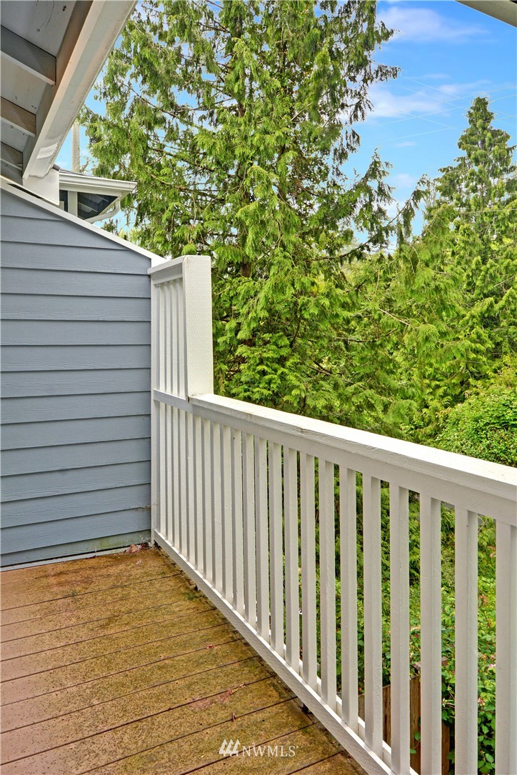 907 225th Place Southeast Bothell, WA 98021 - Photo 13 of 20 a view of a balcony with a tree