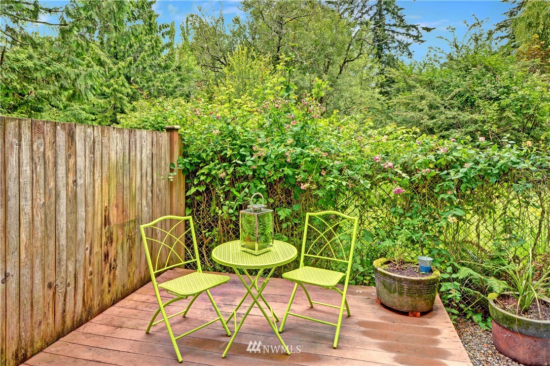 907 225th Place Southeast Bothell, WA 98021 - Photo 17 of 20 a view of a chairs and table in backyard