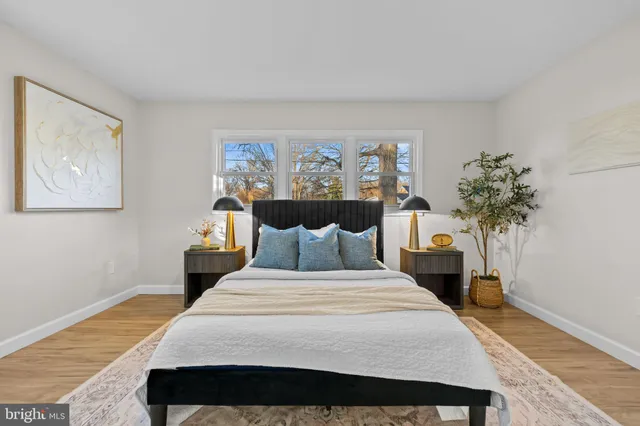 a bathroom with a sink vanity and a mirror