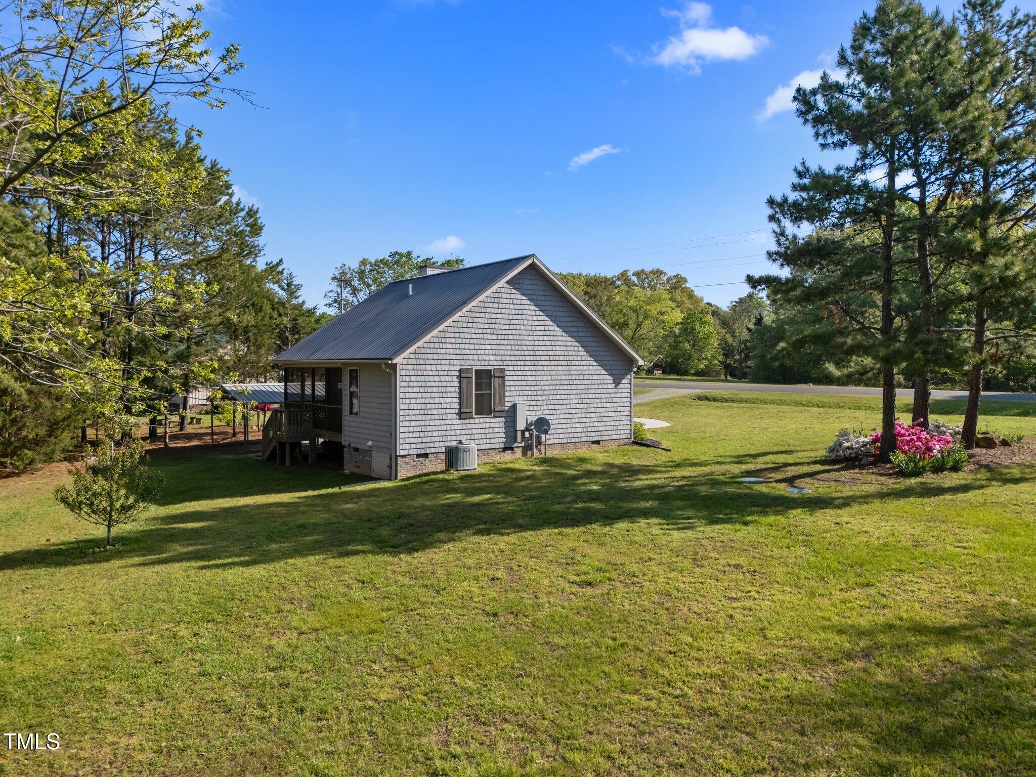 108 Ruff Davis Road Roxboro, NC 27574 - Photo 24 of 28 LeftSideYard