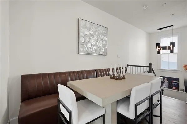 a view of a dining room with furniture