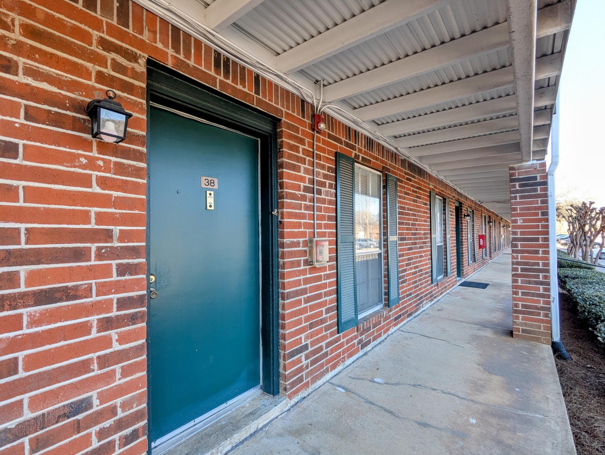 900 Mountain Creek Road, Unit 38 Chattanooga, TN 37405 - Photo 1 of 14 a view of a brick house with stairs