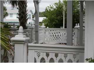 255 Garfield Street Santa Rosa Beach, FL 32459 - Photo 5 of 26 a view of a wooden house with a outdoor space