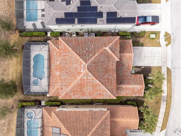 a view of multiple houses with a yard